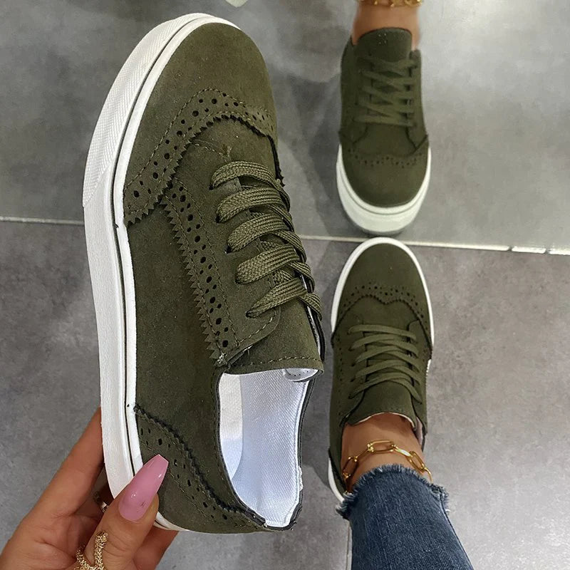 Elegantes zapatillas planas con cordones