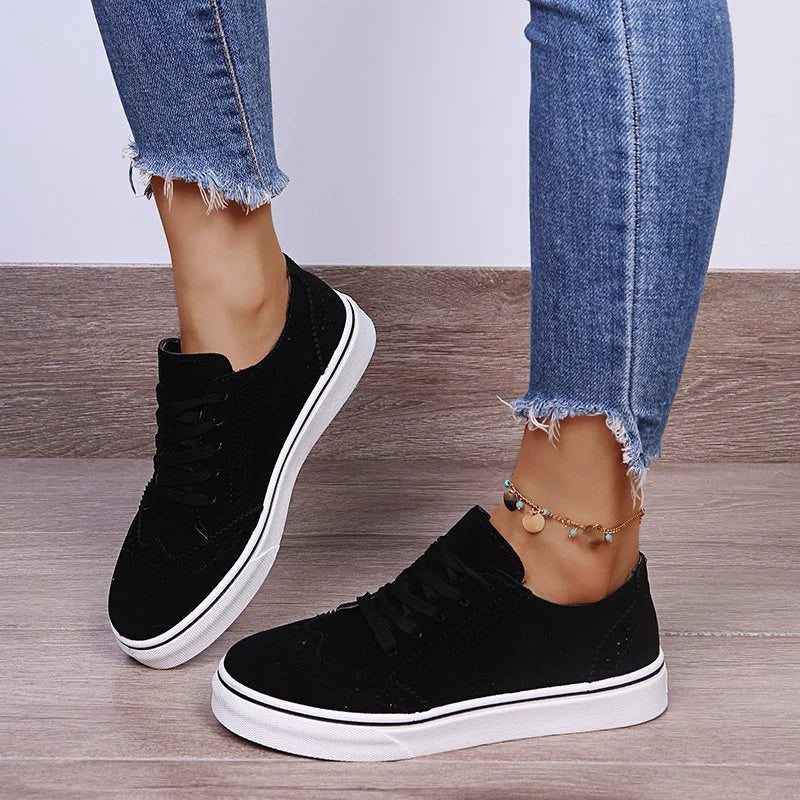 Elegantes zapatillas planas con cordones